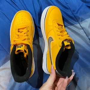 Black and yellow Air Force ones.